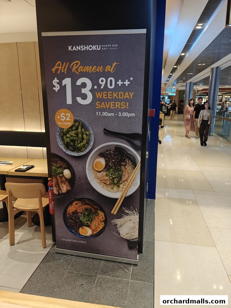 A promotional banner for Kanshoku Ramen Bar featuring a weekday ramen special.