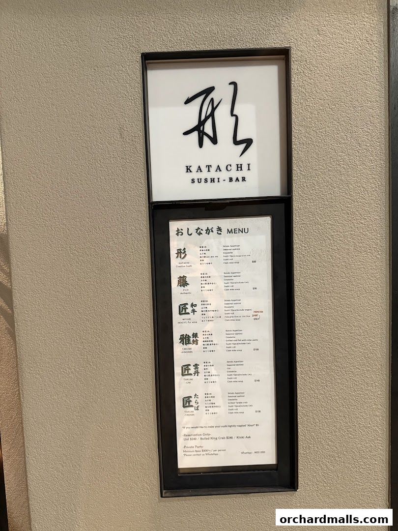 A menu board for Katachi Sushi Bar, featuring Japanese dishes and wine.