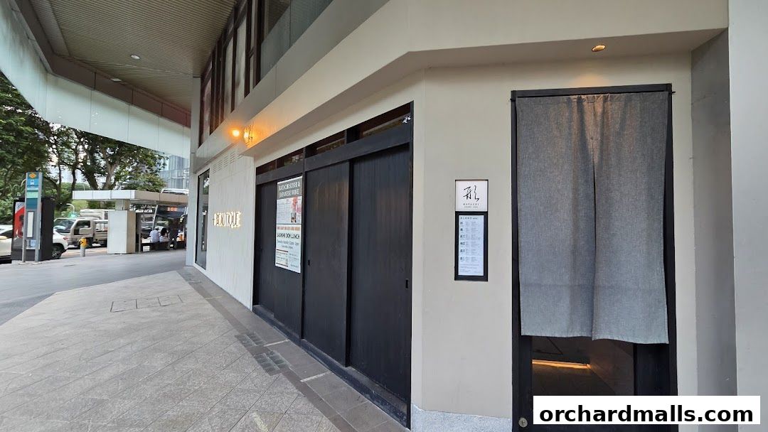 Exterior of Katachi Sushi Bar with traditional Japanese sliding doors and a noren curtain.