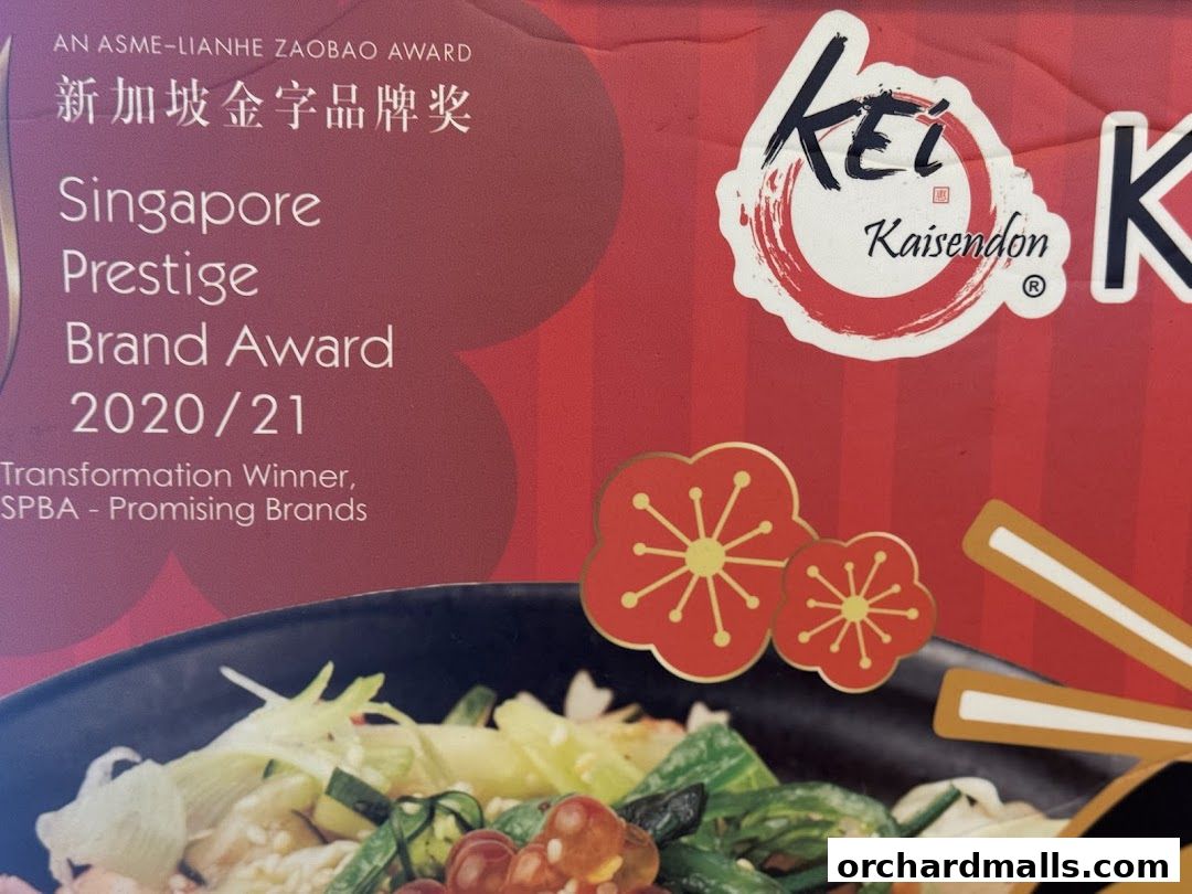 A close-up of a sign for Kei Kaisendon, highlighting their Singapore Prestige Brand Award.