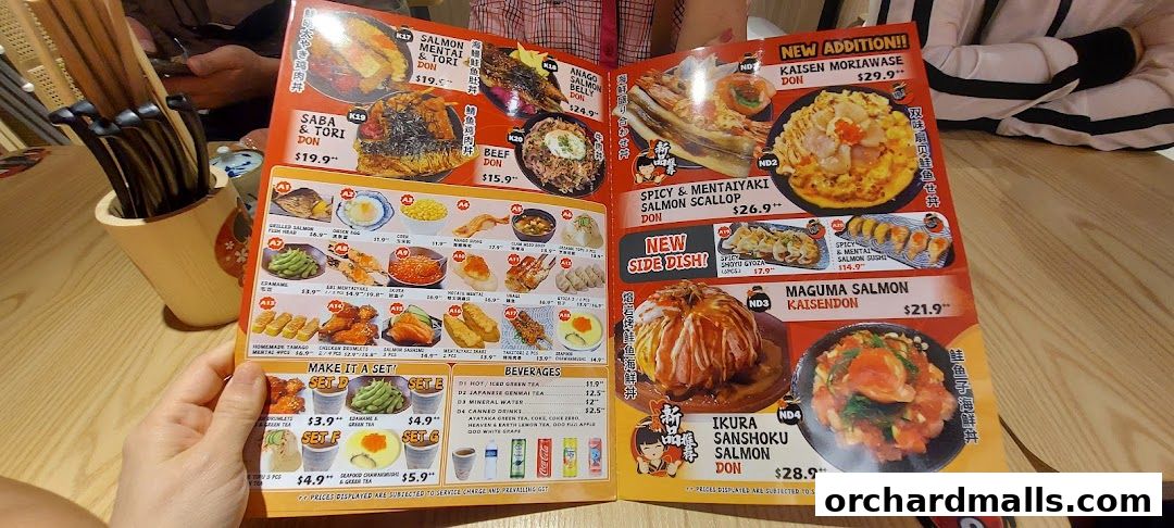 A menu from Kei Kaisendon Wheelock Place featuring various donburi and side dishes.
