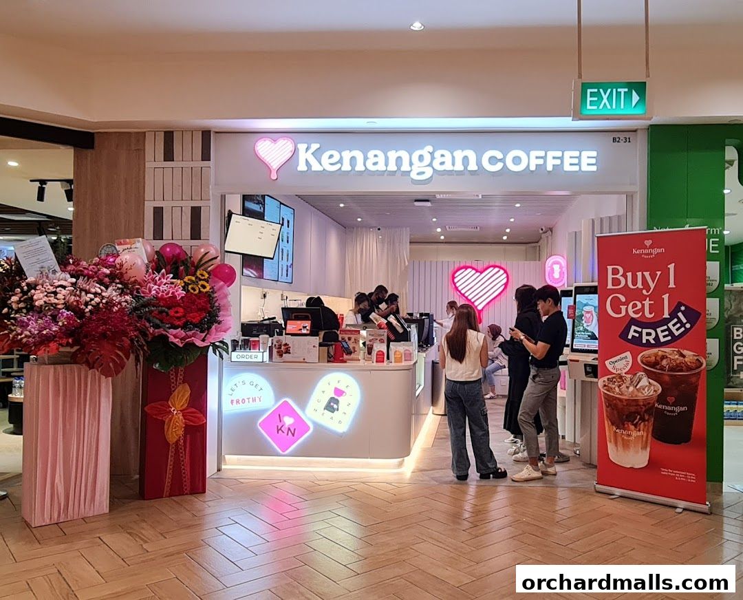 Kenangan Coffee shop front with a 'Buy 1 Get 1 FREE!' promotion banner.