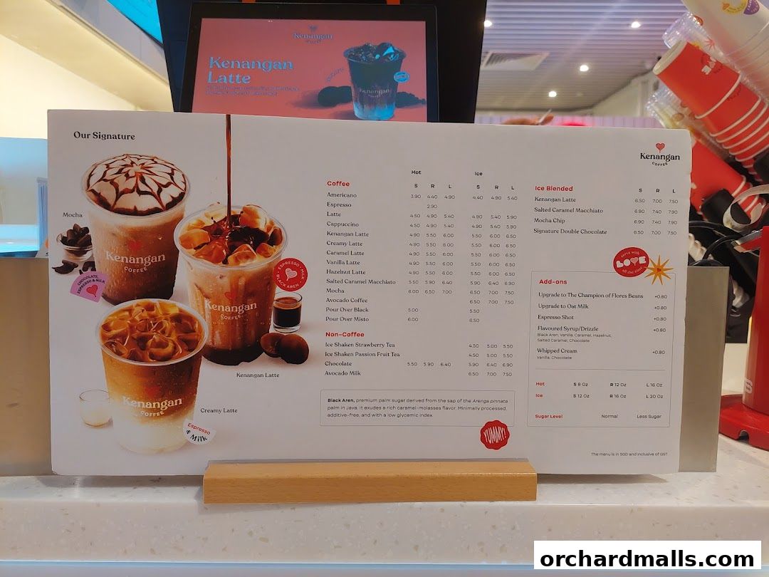 A menu board from Kenangan Coffee showcasing signature drinks and their prices.