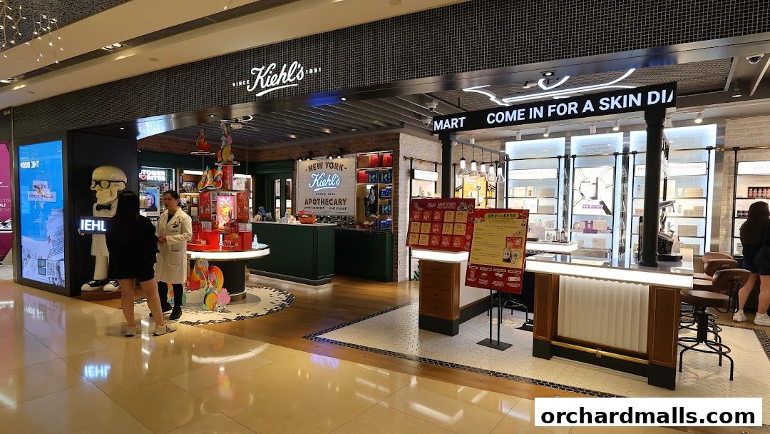 Kiehl's store interior with a consultation counter and product displays.