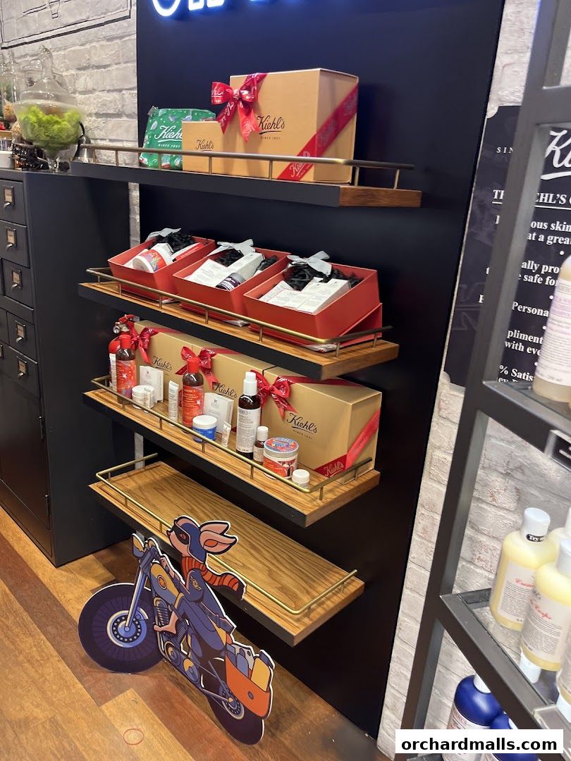 Kiehl's store display featuring gift sets and skincare products.