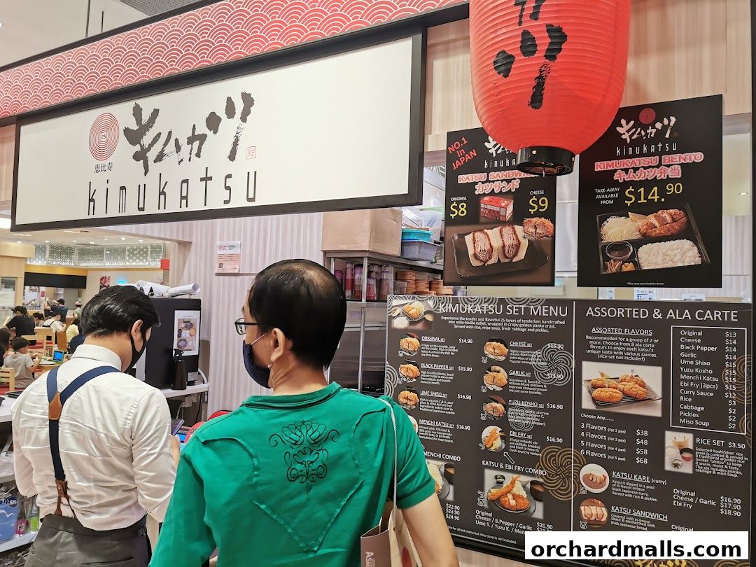 A menu board for Kimukatsu restaurant, showcasing various katsu sets and ala carte options.
