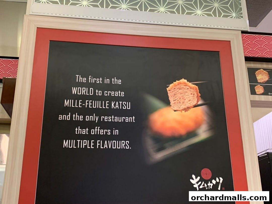 A sign for Kimukatsu restaurant showcasing their signature Mille-Feuille Katsu.
