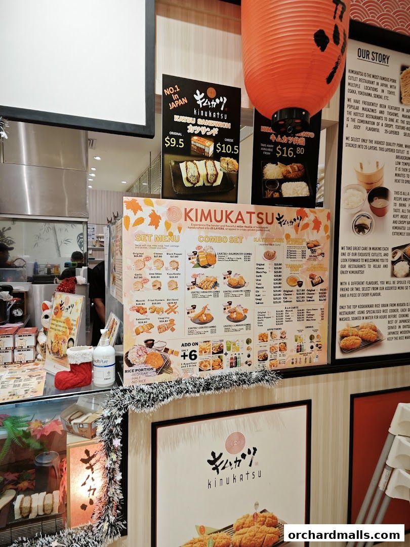 A menu board for Kimukatsu restaurant showcasing katsu sandwiches, bento boxes, and combo sets.
