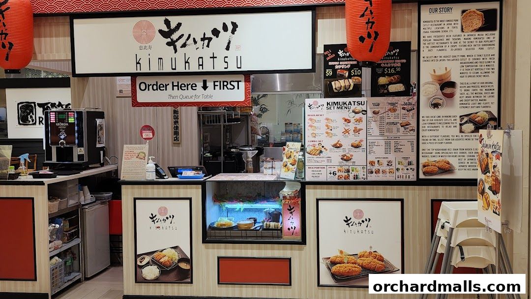 The Kimukatsu shop front displays its logo, menu, and ordering instructions.