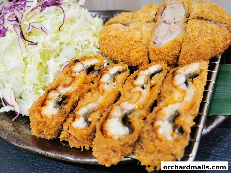 Crispy fried eel and pork cutlets served with shredded cabbage.