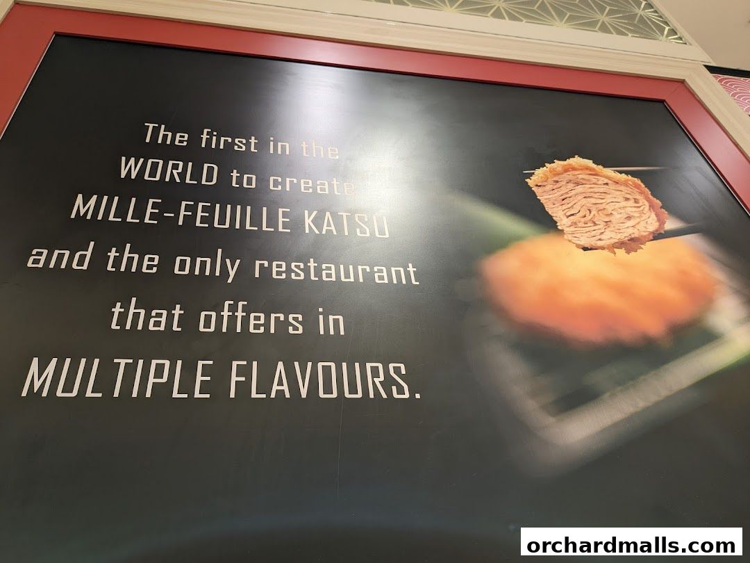 A sign for KIMUKATSU showcasing their unique Mille-Feuille Katsu.