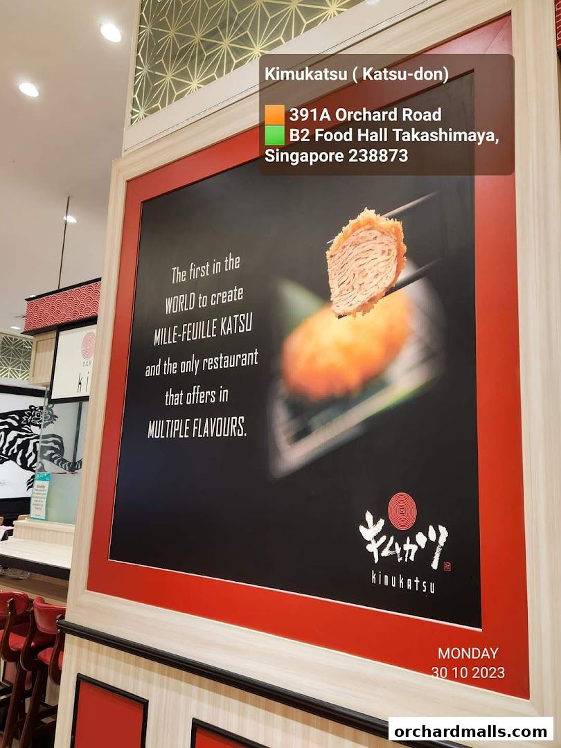 A large advertisement for Kimukatsu restaurant showcasing their Mille-Feuille Katsu.