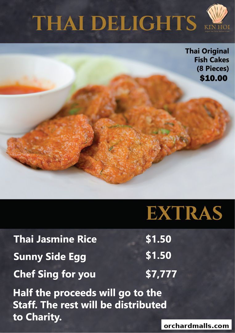 A close-up of Thai fish cakes with a side of sauce and a menu of extras.