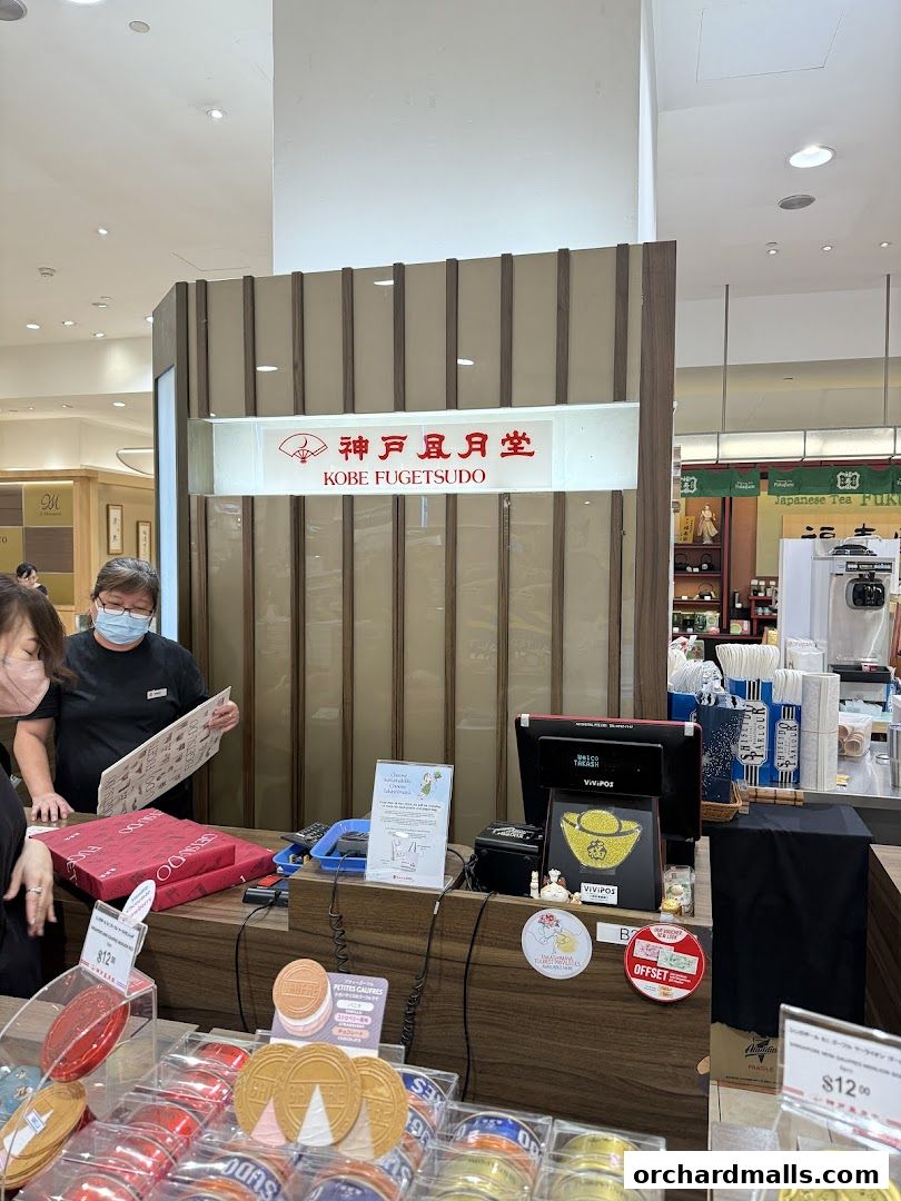 A display of Japanese sweets and gift boxes at Kobe Fugetsudo.