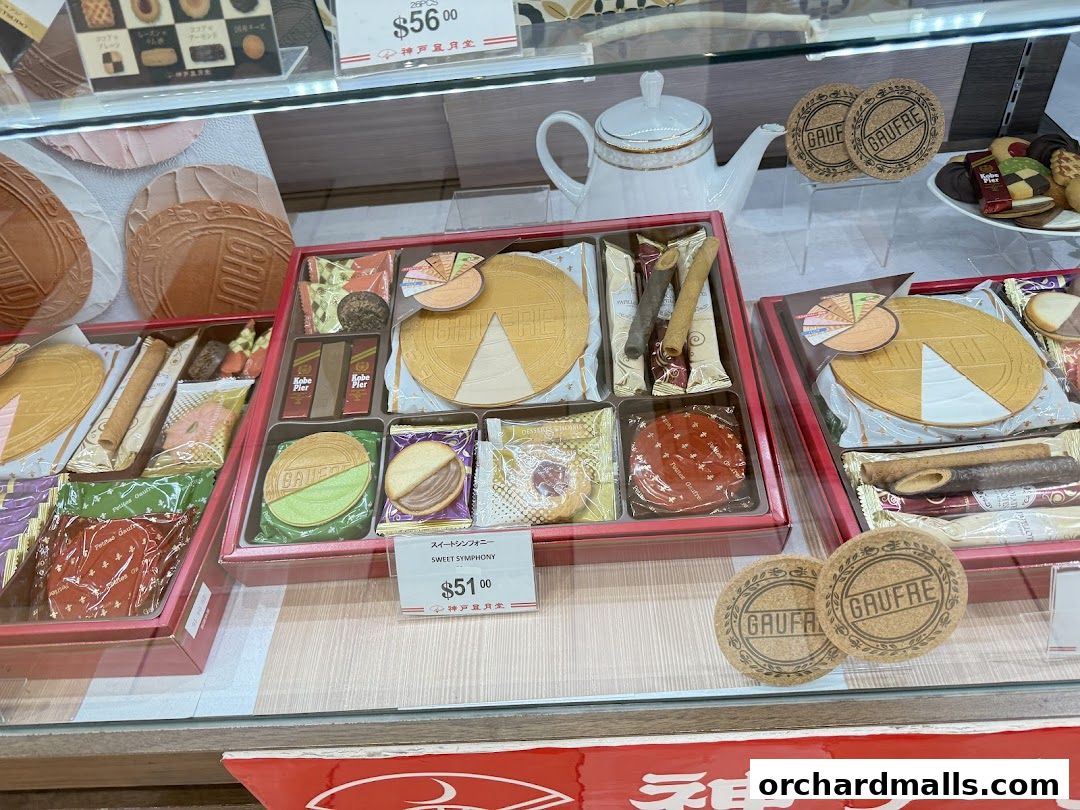 Assortment of gourmet cookies and wafers in gift boxes from Kobe Fugetsudo.