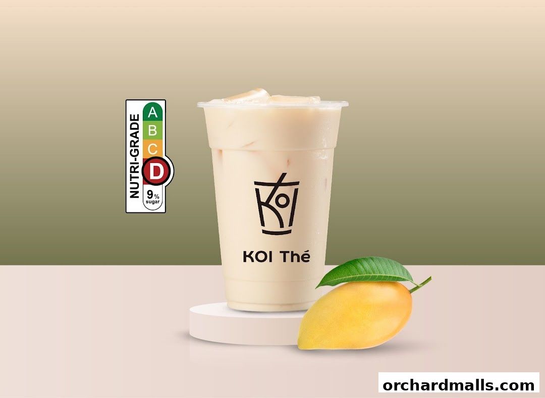 A KOI Thé drink with a Nutri-Grade D label and a mango.