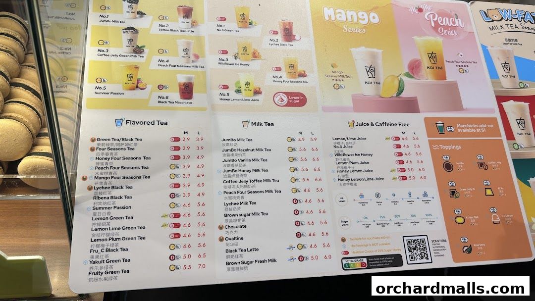 A menu board for KOI Thé Express Takashimaya, showcasing various milk teas, flavored teas, and juices.