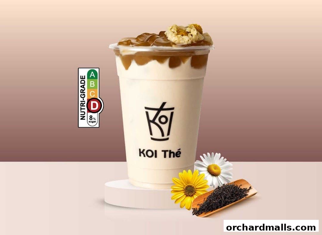 A KOI Thé drink with Nutri-Grade D, featuring tea leaves and flowers.
