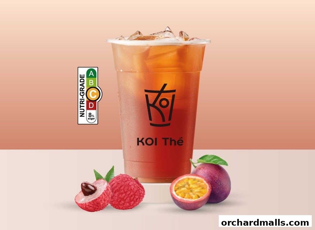 A refreshing KOI Thé drink with lychee and passionfruit, featuring a Nutri-Grade label.