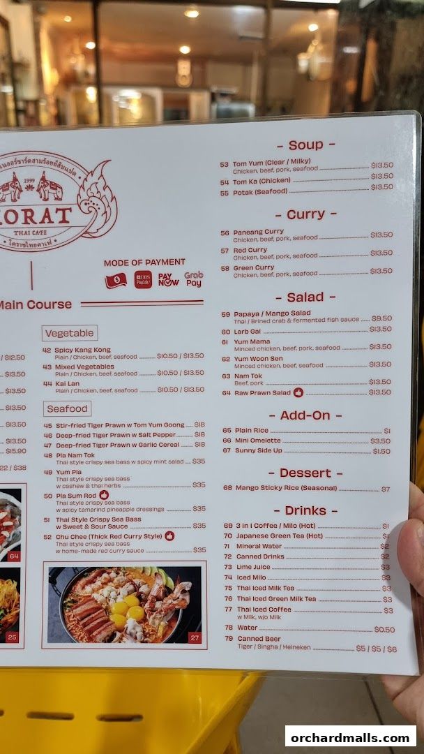 A menu from Korat Thai Cafe featuring soups, curries, salads, seafood, and drinks.