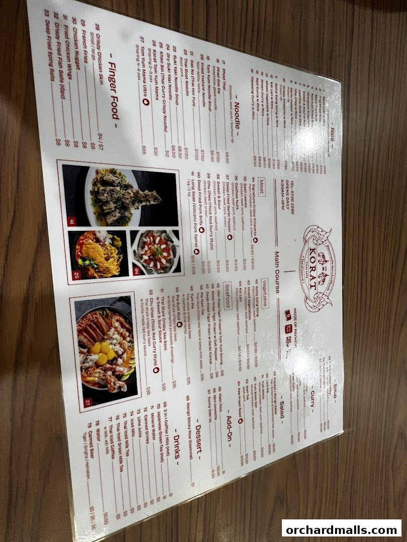 A menu from Korat Thai Cafe with various Thai dishes, drinks, and desserts.