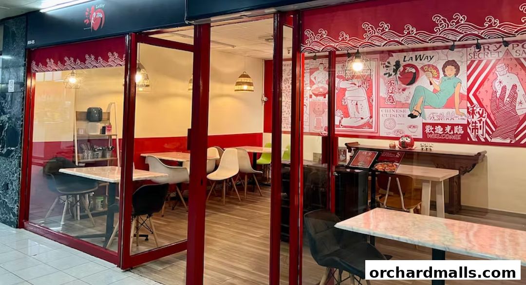 Exterior view of La Way, a Chinese cuisine and mala hotpot restaurant with red accents.