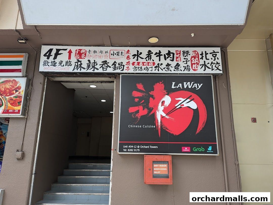 Entrance to La Way Chinese Cuisine restaurant on the 4th floor, featuring a prominent sign.