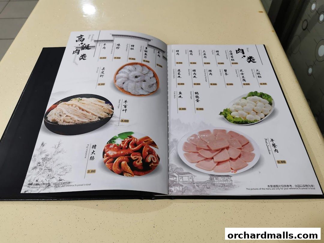 A menu featuring various meat and seafood dishes with accompanying images and prices.