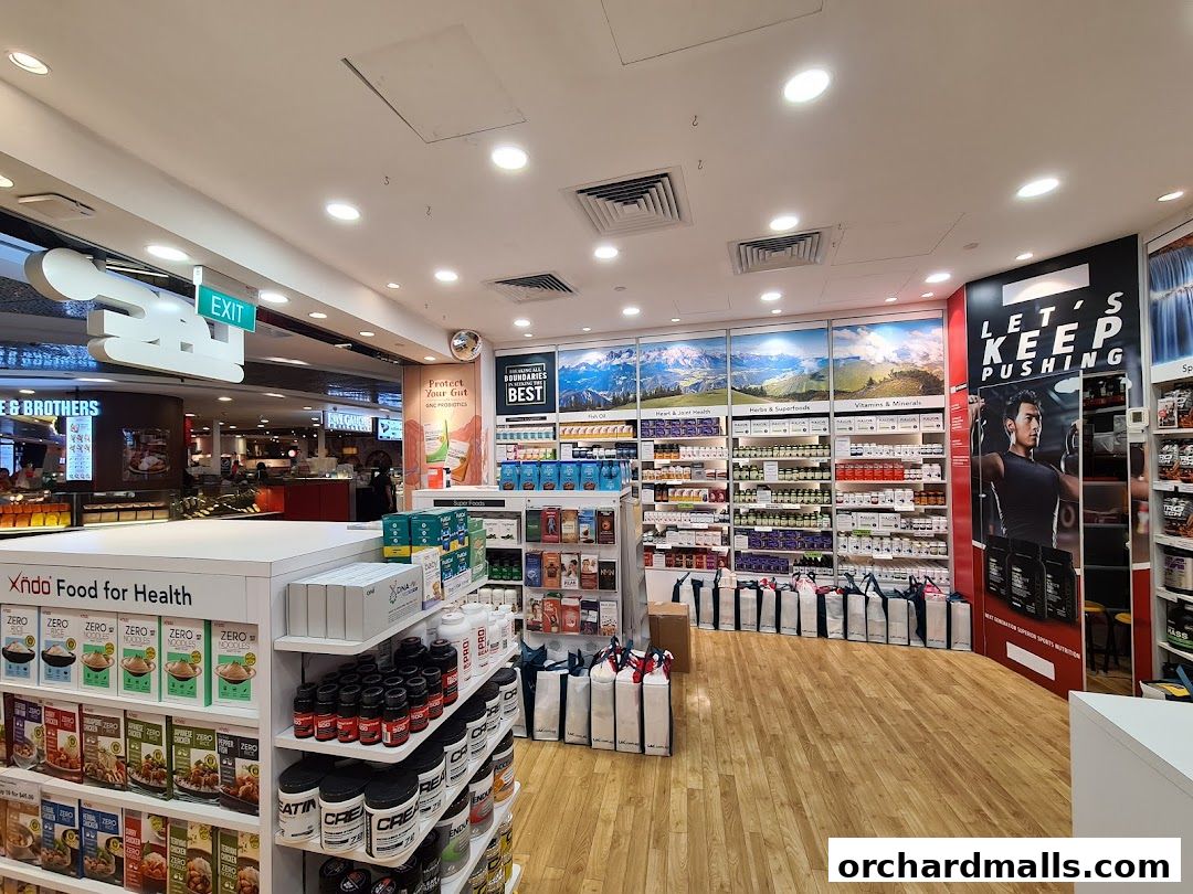 Interior view of a health and nutrition store with shelves stocked with supplements and food products.