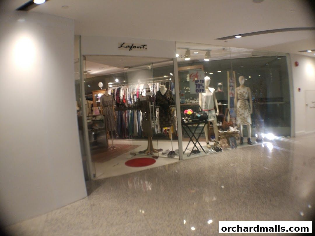 The Lafont shop entrance displays clothing on mannequins and racks, with a sale sign.