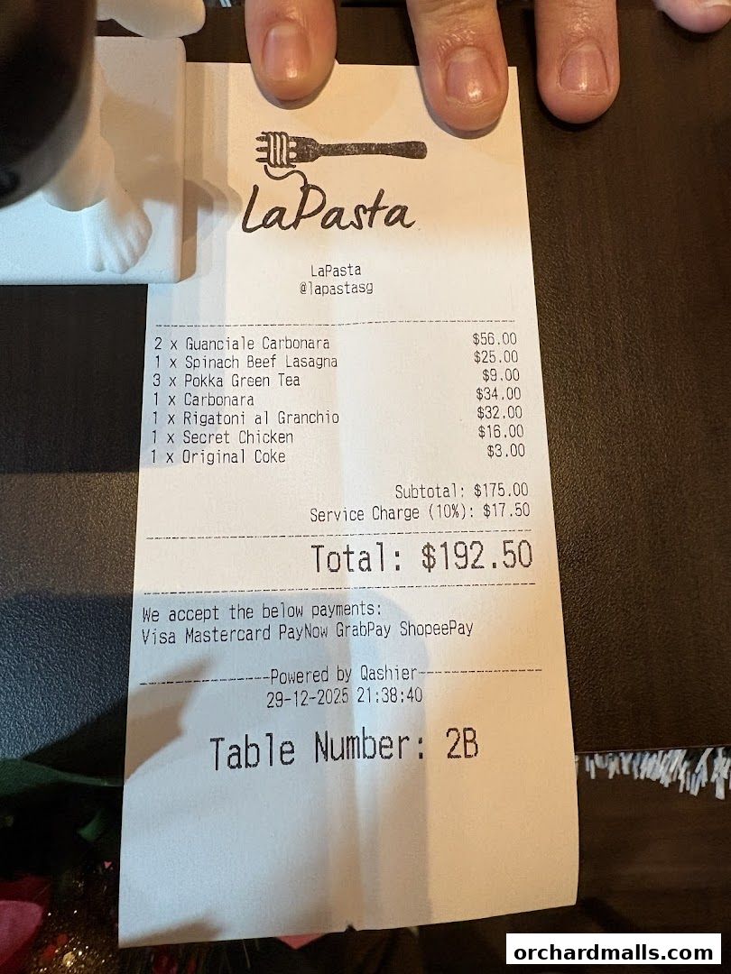 A receipt from LaPasta showing a list of food and drinks ordered and their prices.