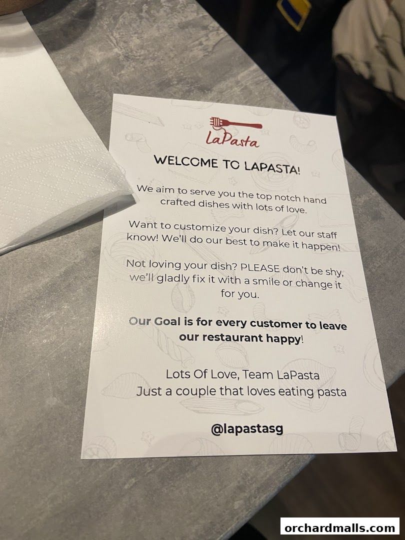 A welcome card from LaPasta restaurant with a message about their service and customer satisfaction.