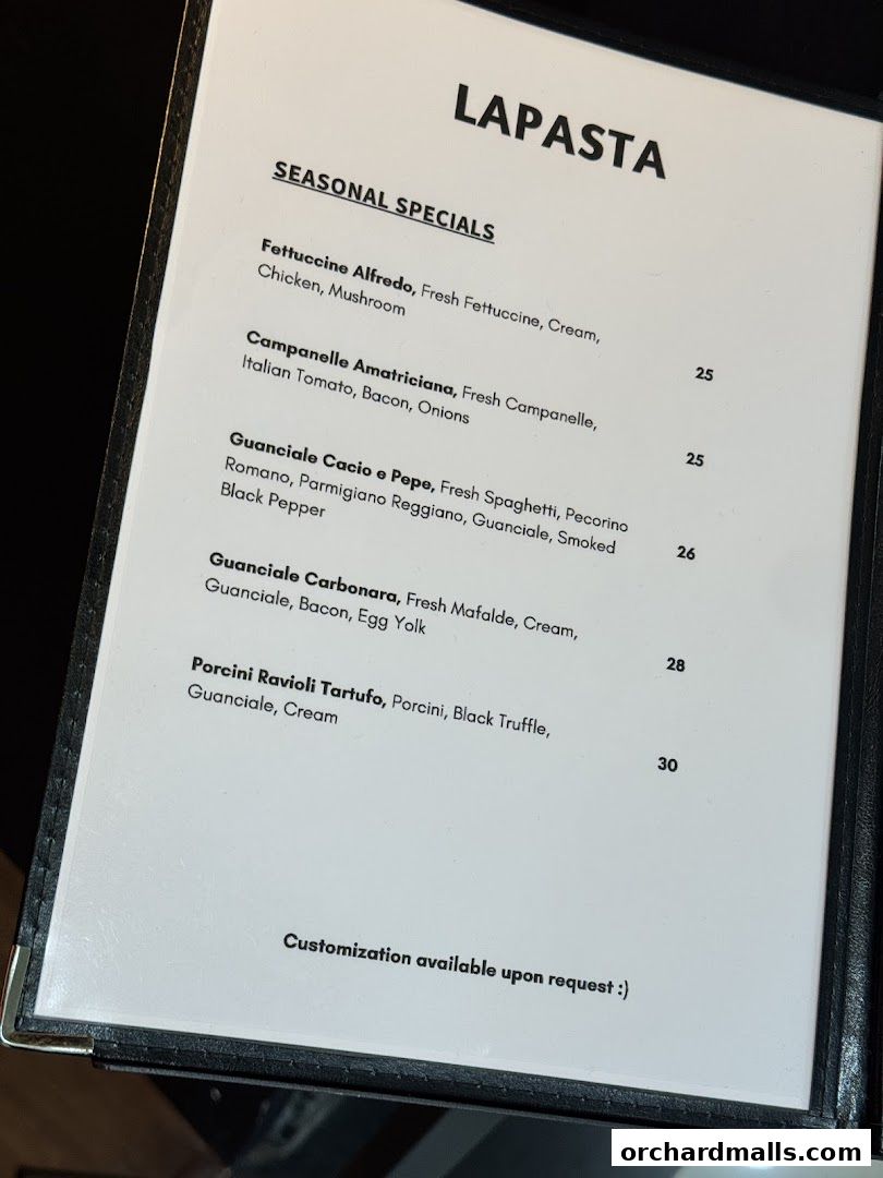 A menu from LaPasta featuring seasonal pasta specials with prices.