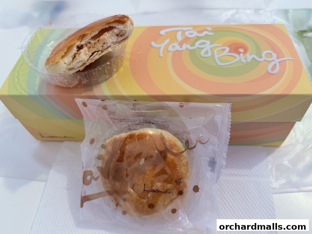 A box of Tai Yang Bing pastries from Lavender Bakery, with two pastries shown.