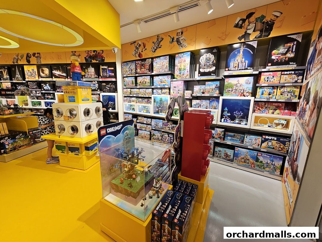 Interior of a LEGO Certified Store with shelves full of LEGO sets and displays.
