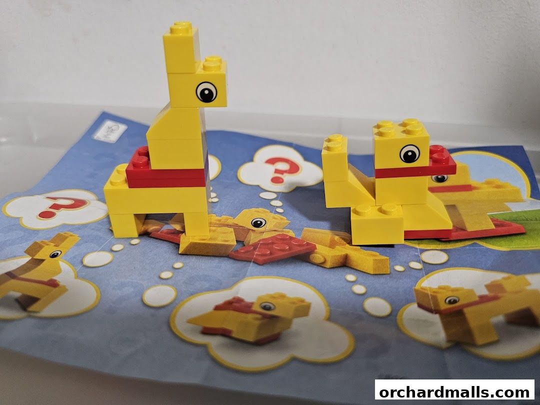 LEGO bricks built into yellow duck figures on a colorful instruction sheet.