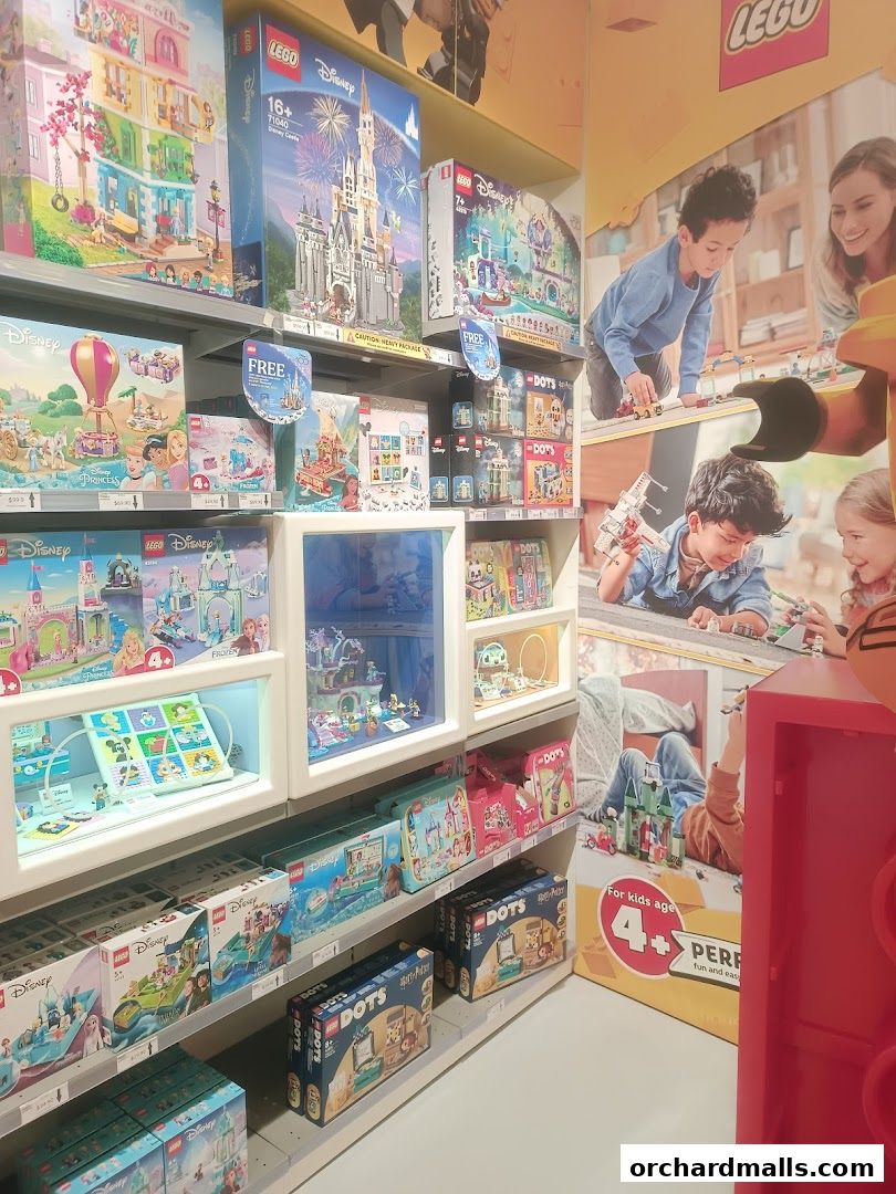 Shelves filled with various LEGO Disney and DOTS sets, showcasing colorful building toys.