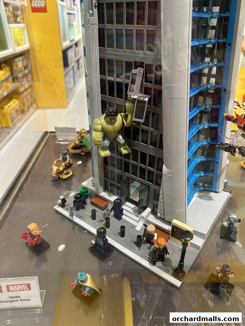 LEGO Marvel Avengers Tower display with Hulk and other minifigures.