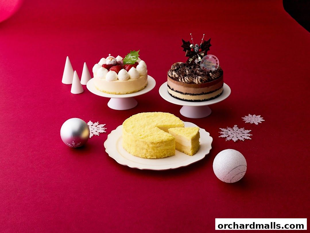 Three festive cakes displayed on a red background with Christmas decorations.