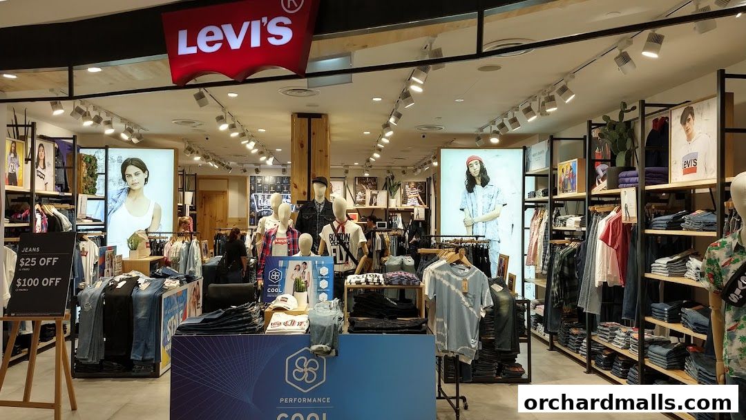 Interior view of a Levi's store showcasing jeans, t-shirts, and mannequins with apparel.