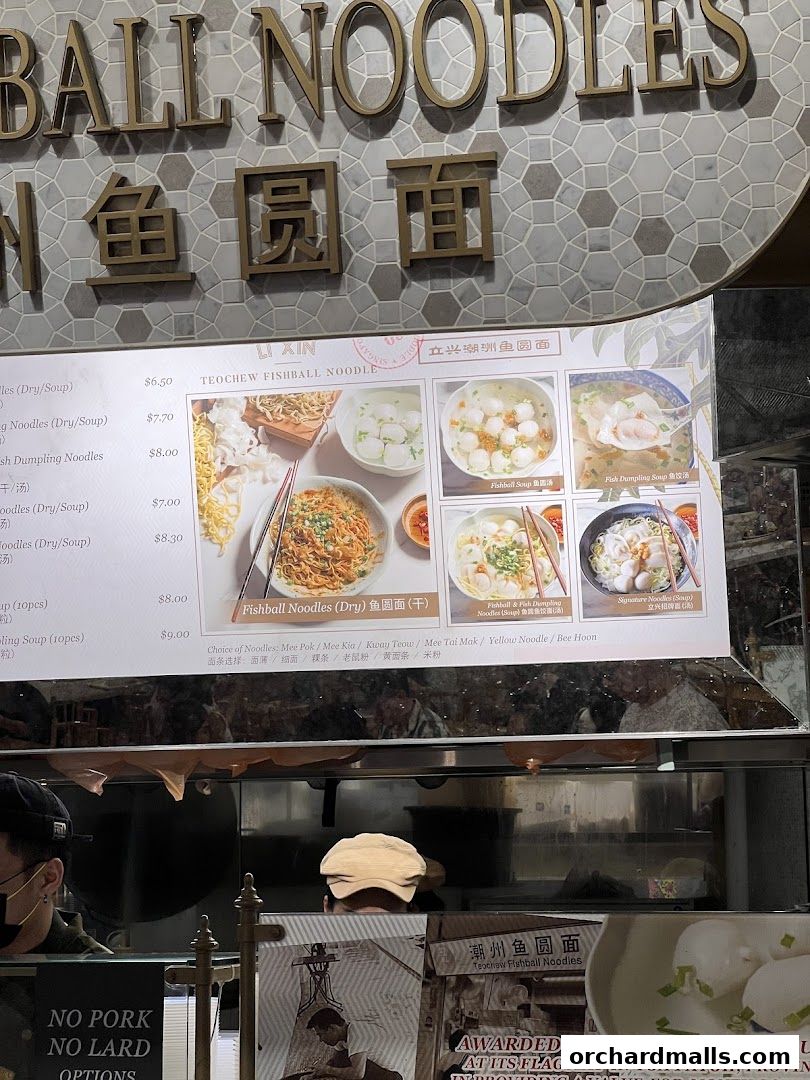 A menu board for Li Xin Teochew Fishball Noodles, showcasing various noodle dishes and prices.