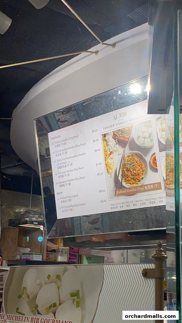 A menu for Li Xin Teochew Fishball Noodles, featuring noodle and soup dishes with prices.