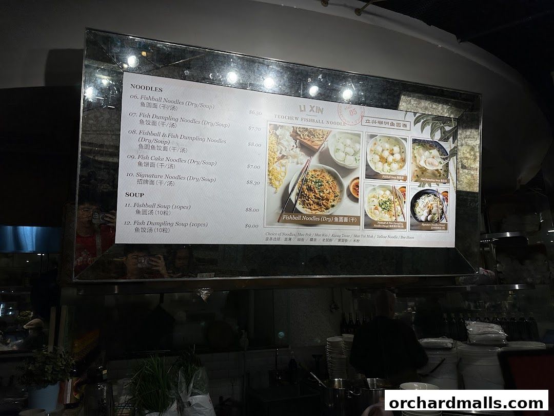 A menu board displaying various noodle and soup dishes with prices and images.
