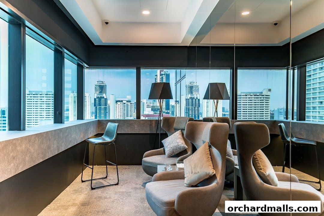 Modern waiting area with comfortable chairs and city views.