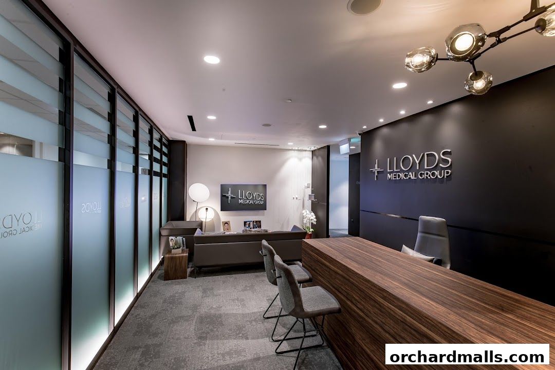 Modern reception area of Lloyds Medical Group with a sleek desk and waiting lounge.