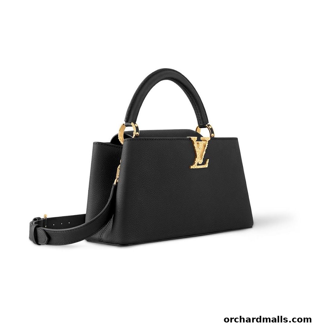 A black Louis Vuitton handbag with gold hardware and a detachable strap.