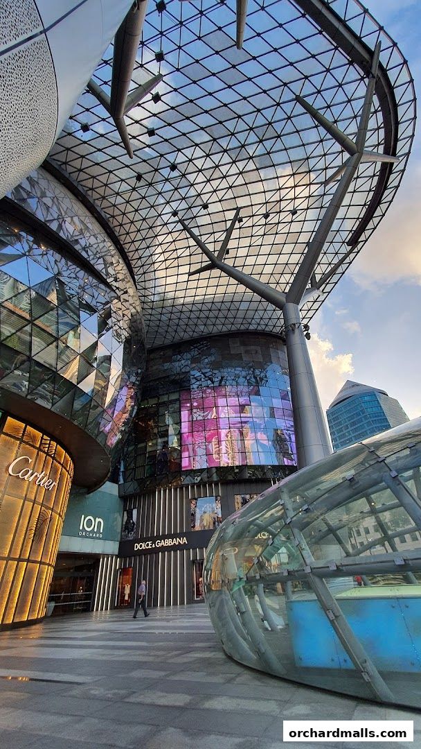Exterior view of luxury brand stores and modern architecture at ION Orchard.
