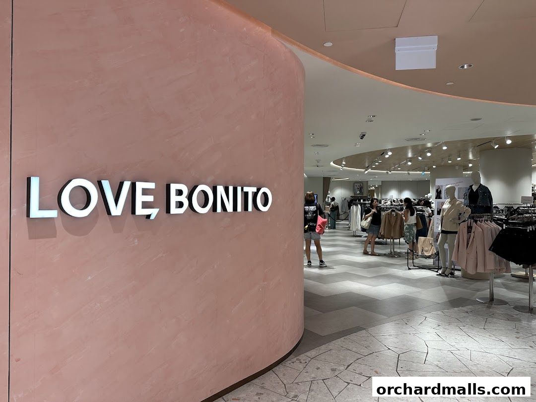 Interior view of a Love, Bonito store showcasing clothing racks and mannequins.