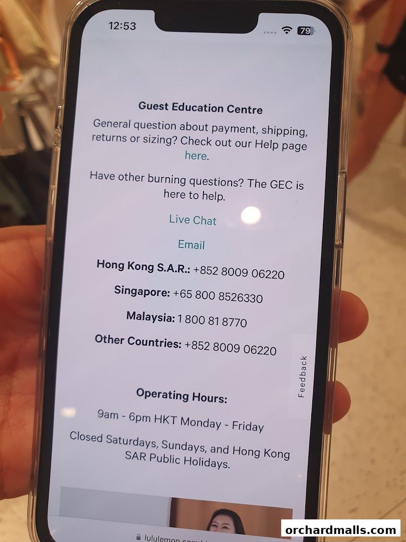 A phone screen displays Lululemon's Guest Education Centre contact information and operating hours.