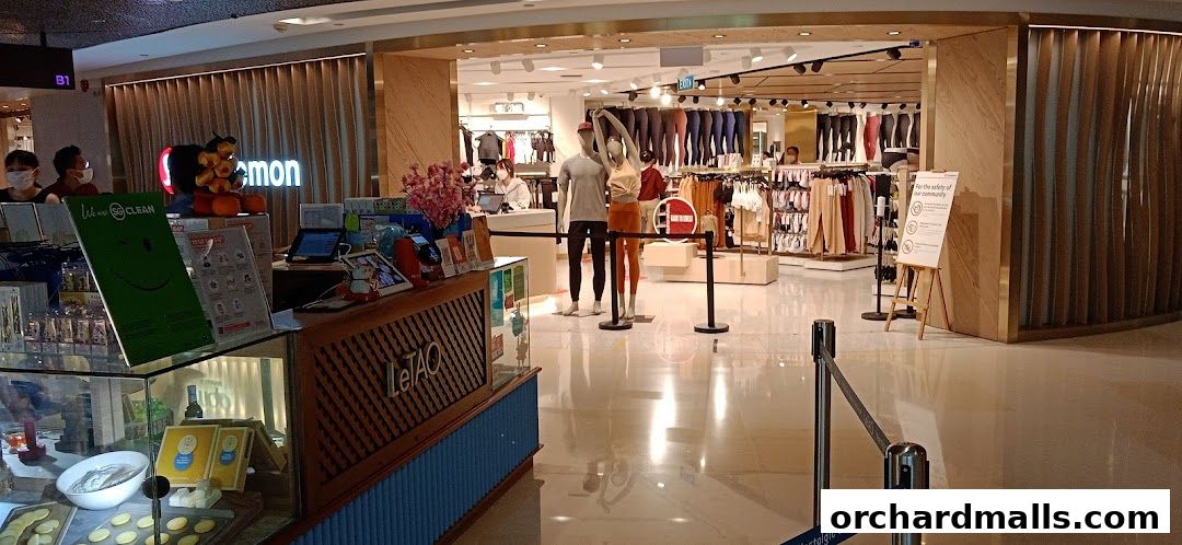 Interior view of a Lululemon store showcasing athletic apparel and mannequins.